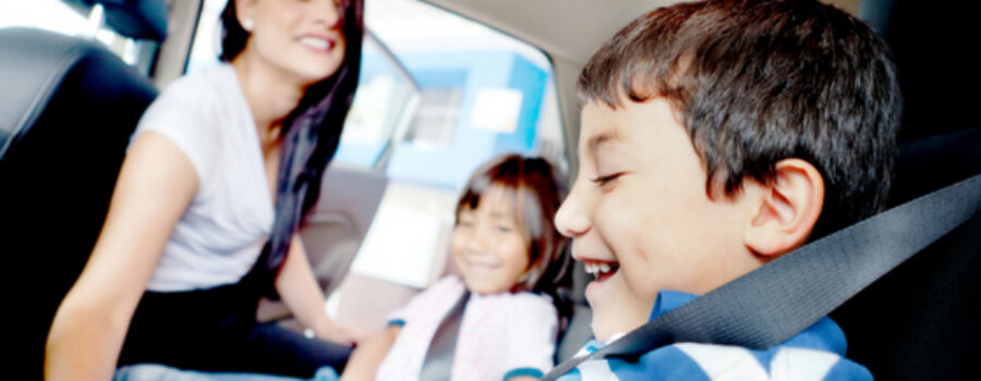 parent with kids in car